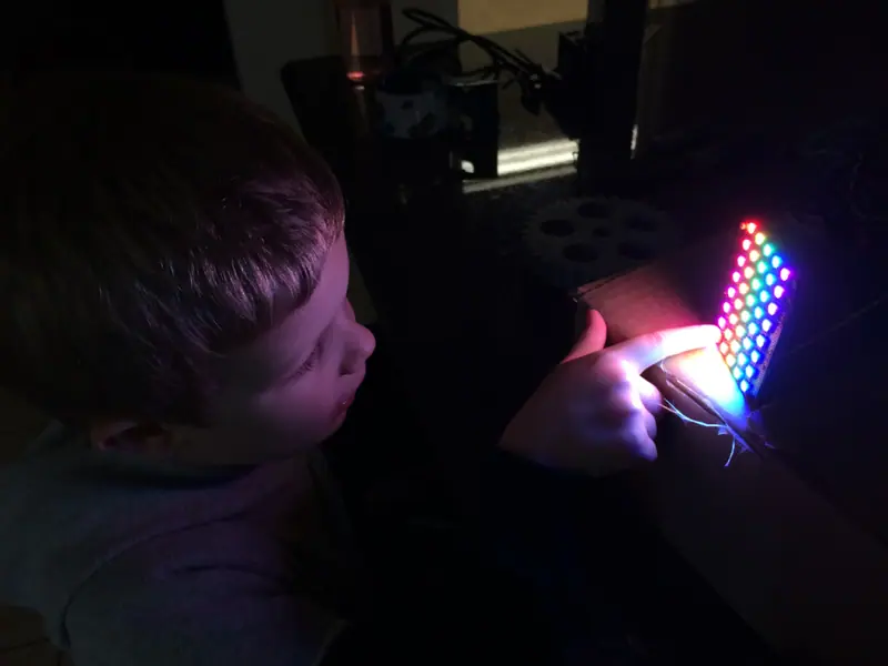 Austin’s son watching an array of LEDs run a sequence